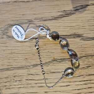 Elegant Silver Bracelet with Brown Accents